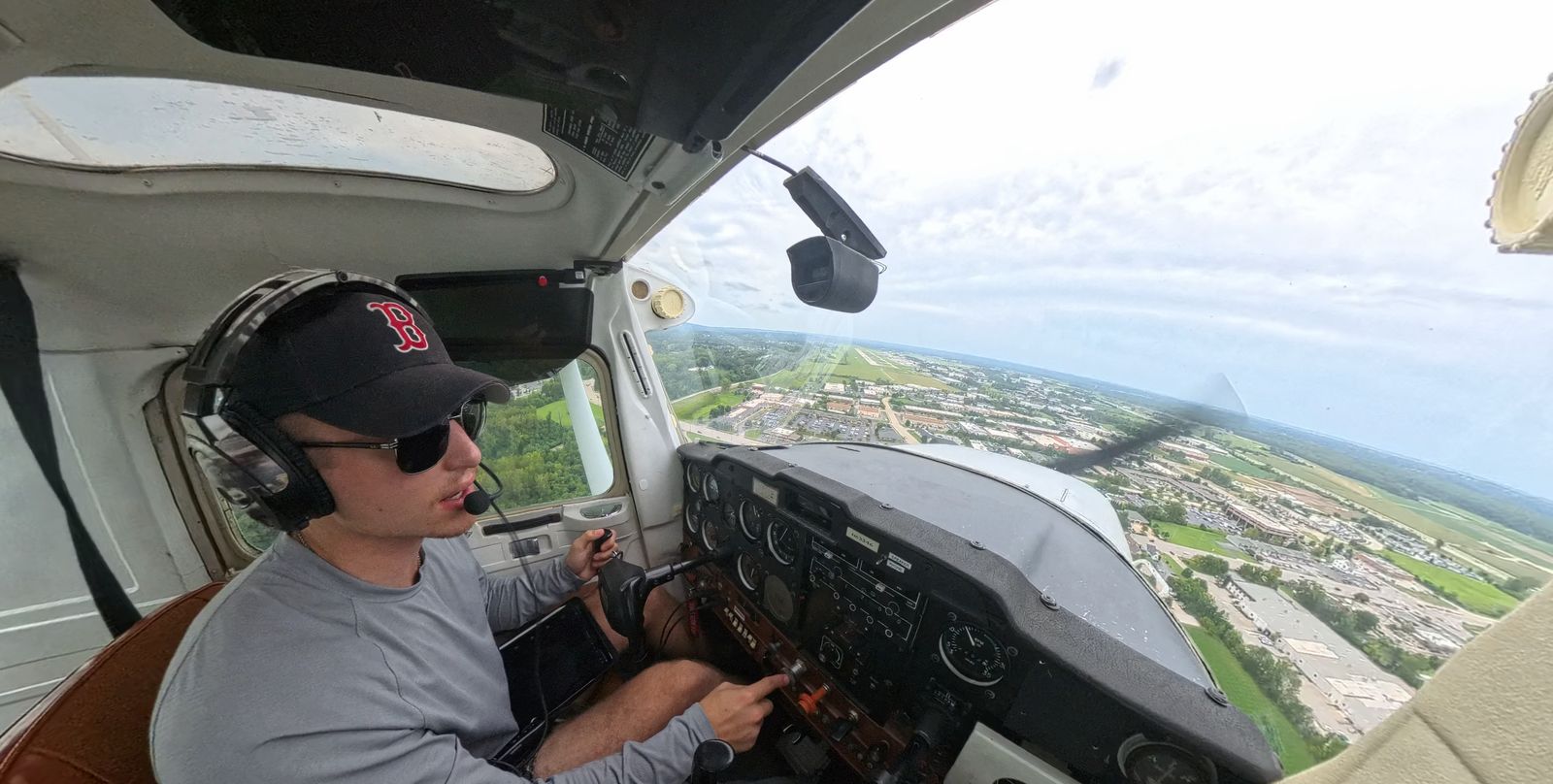 Carter Rosenberger flying a Cessna 150 near Spirit of St. Louis Airport